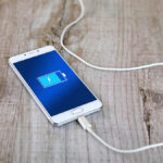 If you charge your cell phone for a long time, does it truly harm its charger?